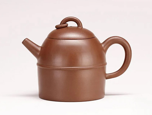 裴石民制串顶秦钟壶