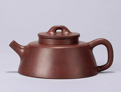 老艺人裴石民制鱼罩壶