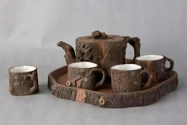 裴石民制紫砂松段茶具