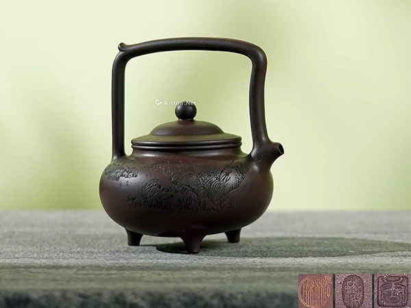 谭泉海刻唐彬杰制鹿鼎提梁壶拍卖